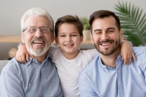 Portrait of grandfather, father, and son